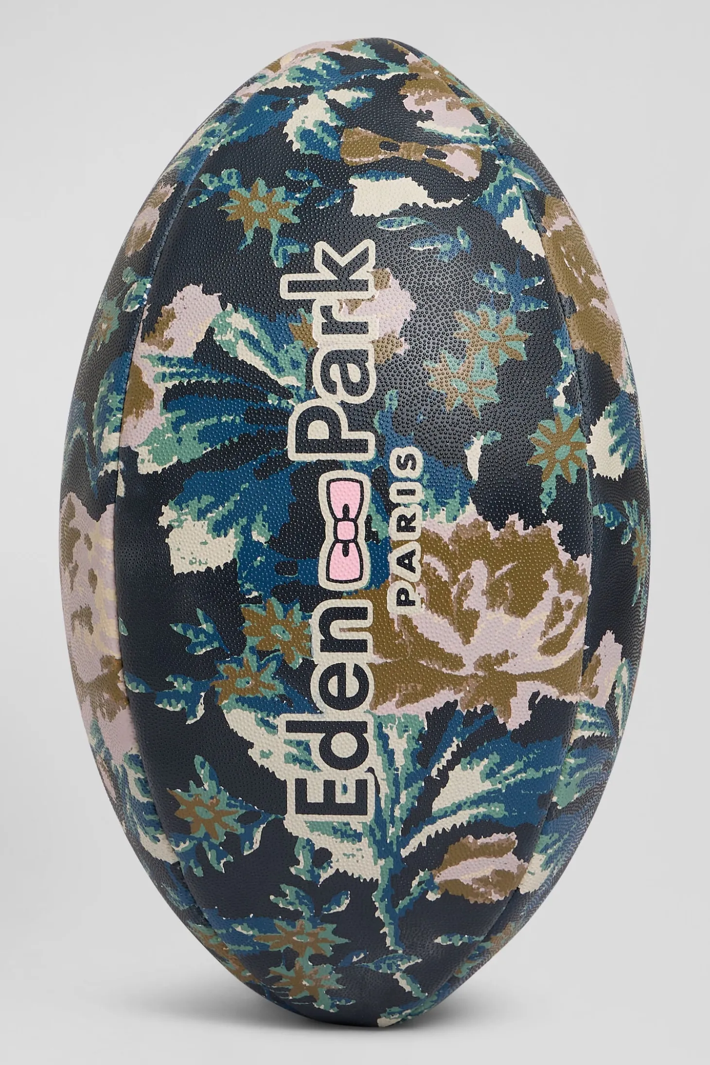 Ballon de rugby bleu marine à motifs floraux