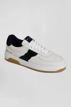 Baskets basses en cuir blanc découpe bleu marine