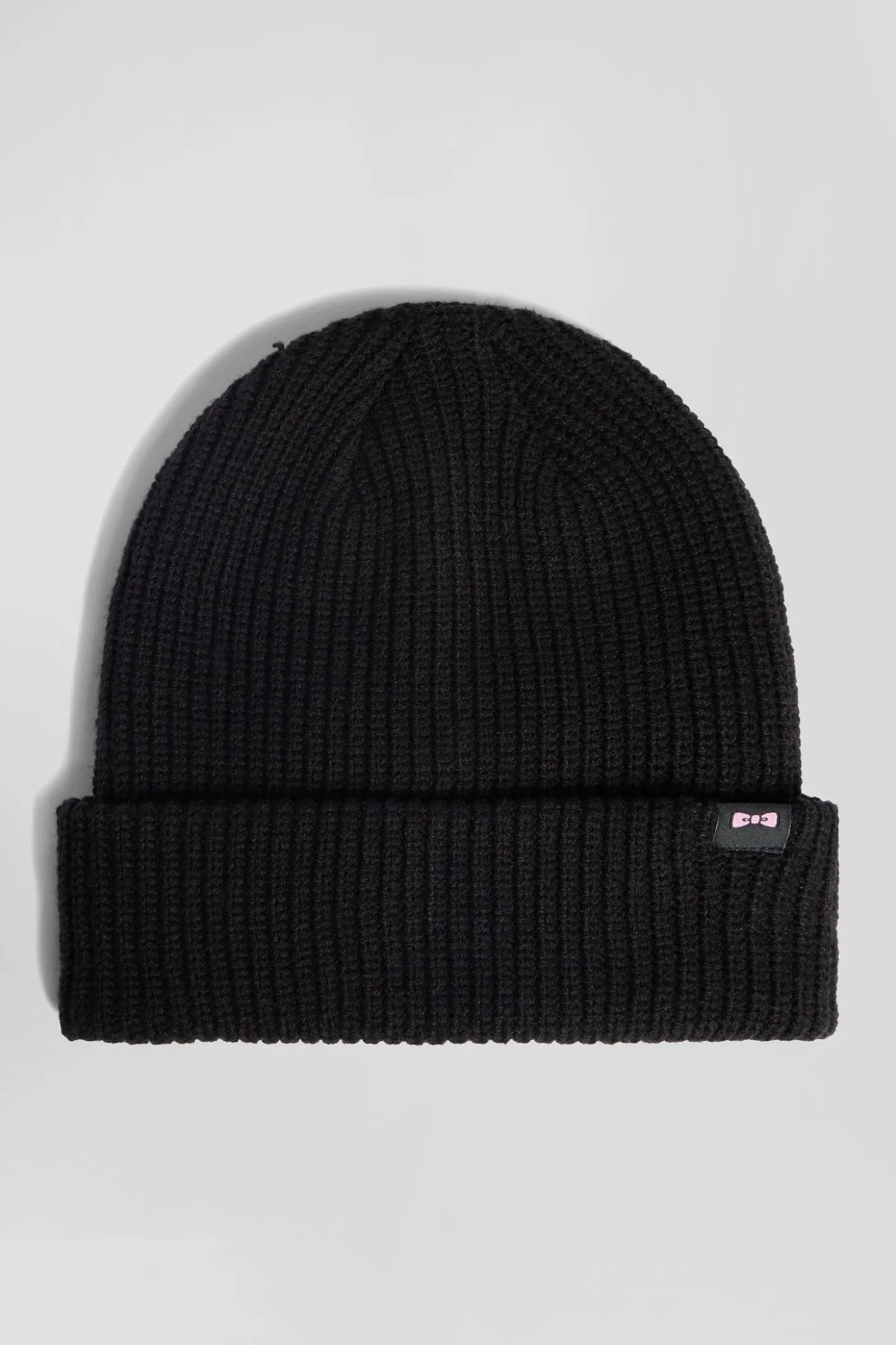 Bonnet en maille noir broderie nœud papillon