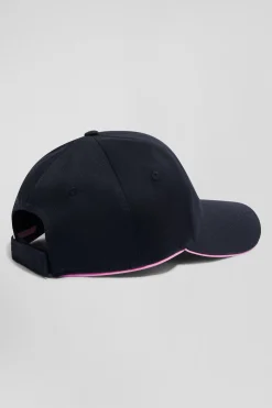 Casquette en coton bleu marine badge nœud papillon passepoil rose