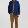 Chemise en coton uni bleu indigo col boutonné et poche poitrine coupe Regular