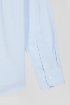 Chemise en coton uni ciel col boutonné et poche poitrine coupe Regular