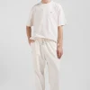 Jogging unisexe en molleton coton écru surteint coupe Relaxed