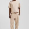 Jogging unisexe en molleton coton beige surteint coupe Relaxed