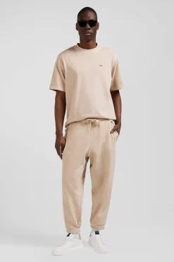 Jogging unisexe en molleton coton beige surteint coupe Relaxed