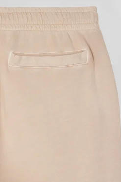 Jogging unisexe en molleton coton beige surteint coupe Relaxed