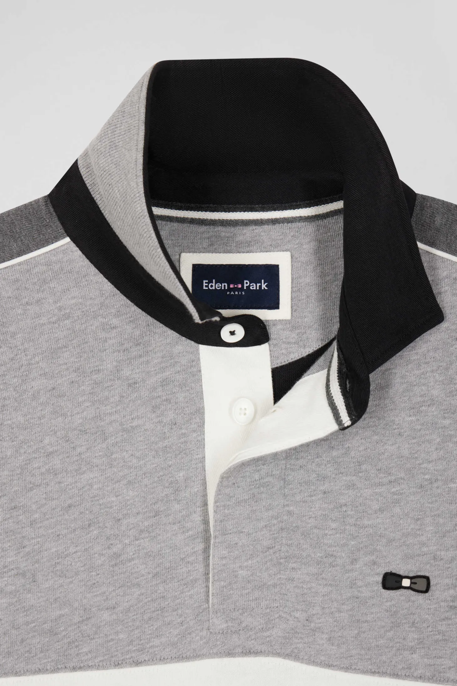 Maillot manches longues en coton noir broderie dos et passepoil coupe Regular