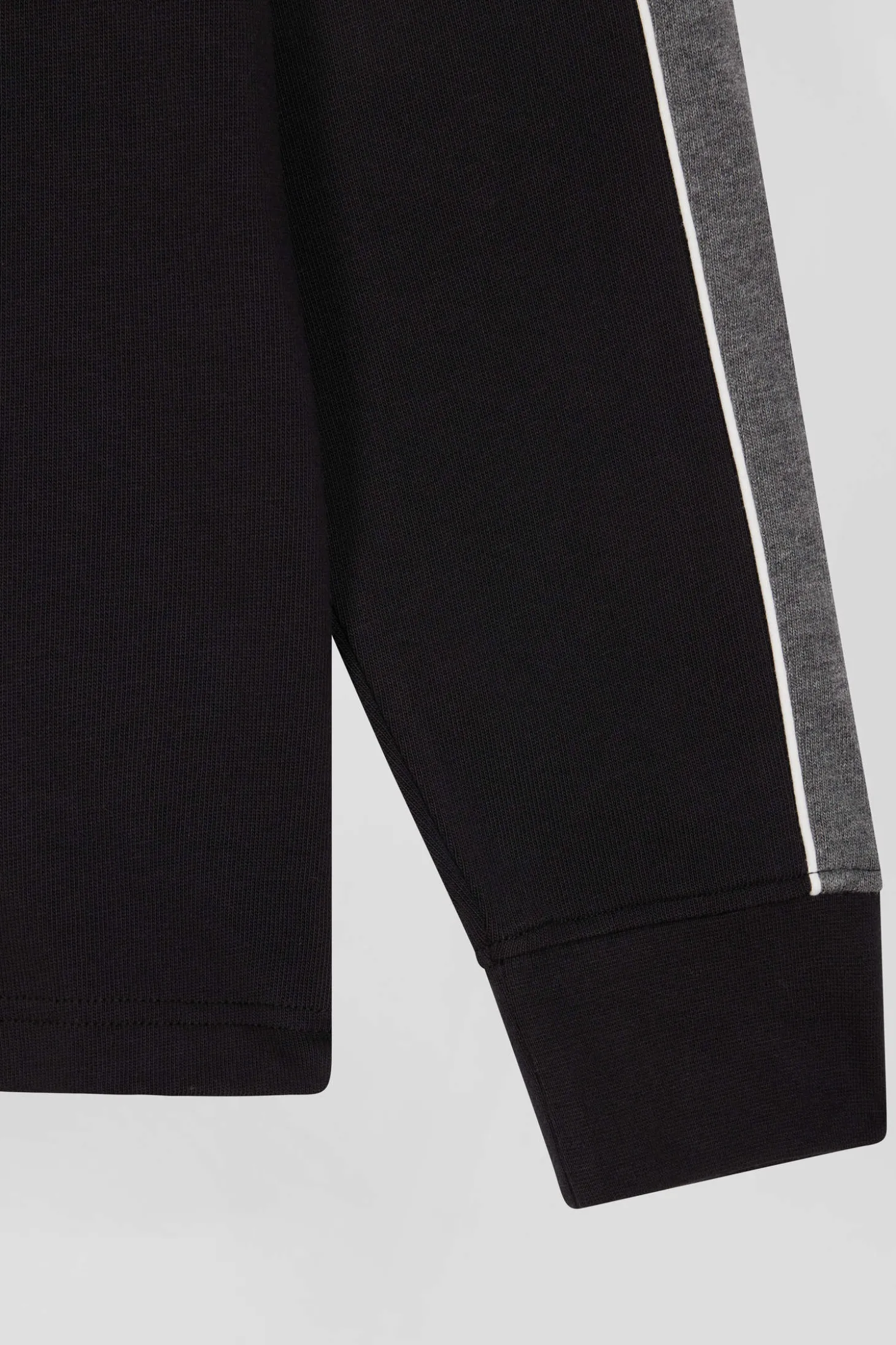 Maillot manches longues en coton noir broderie dos et passepoil coupe Regular