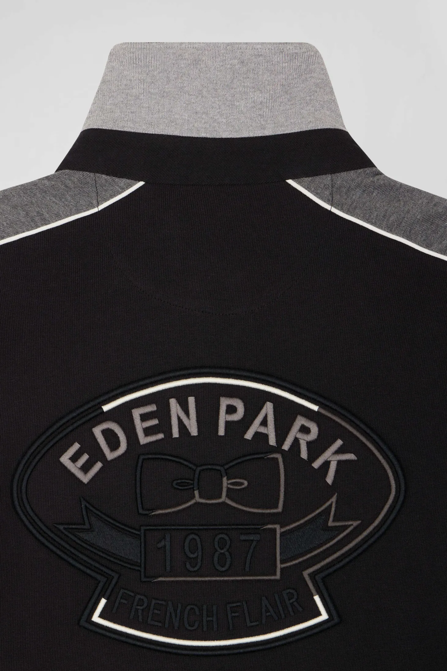 Maillot manches longues en coton noir broderie dos et passepoil coupe Regular