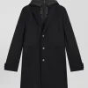 Manteau en jersey de laine double face noir parmenture matelassée