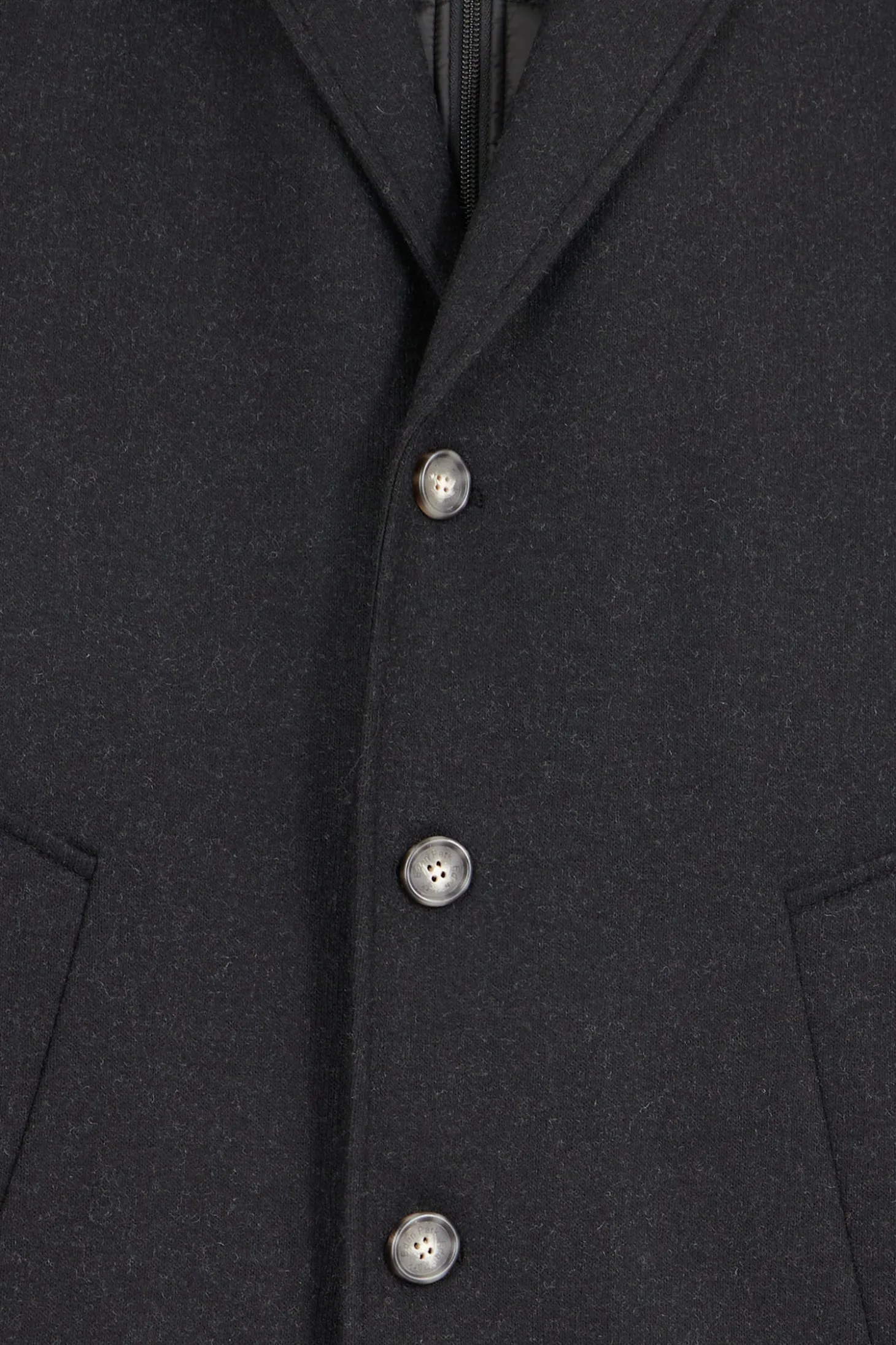 Manteau en jersey de laine double face noir parmenture matelassée
