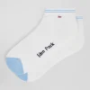 Paire de socquettes bicolore en coton blanc bords à rayures cerclées