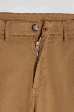Pantalon chino en piqué de coton stretch et modal beige coupe Regular