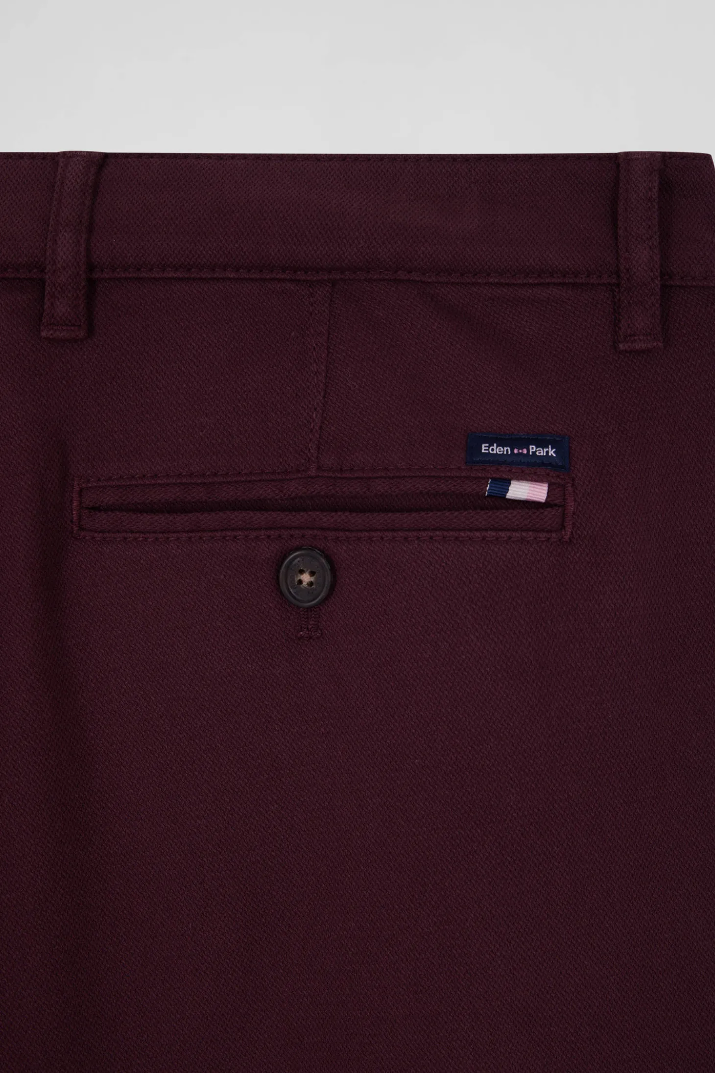 Pantalon chino en piqué de coton stretch et modal bordeaux coupe Regular
