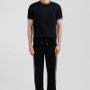 Pantalon jogging en coton mélangé noir coupe Regular passepoil jambes