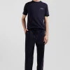 Pantalon jogging en coton mélangé bleu marine coupe Regular passepoil rose
