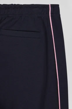 Pantalon jogging en coton mélangé bleu marine coupe Regular passepoil rose