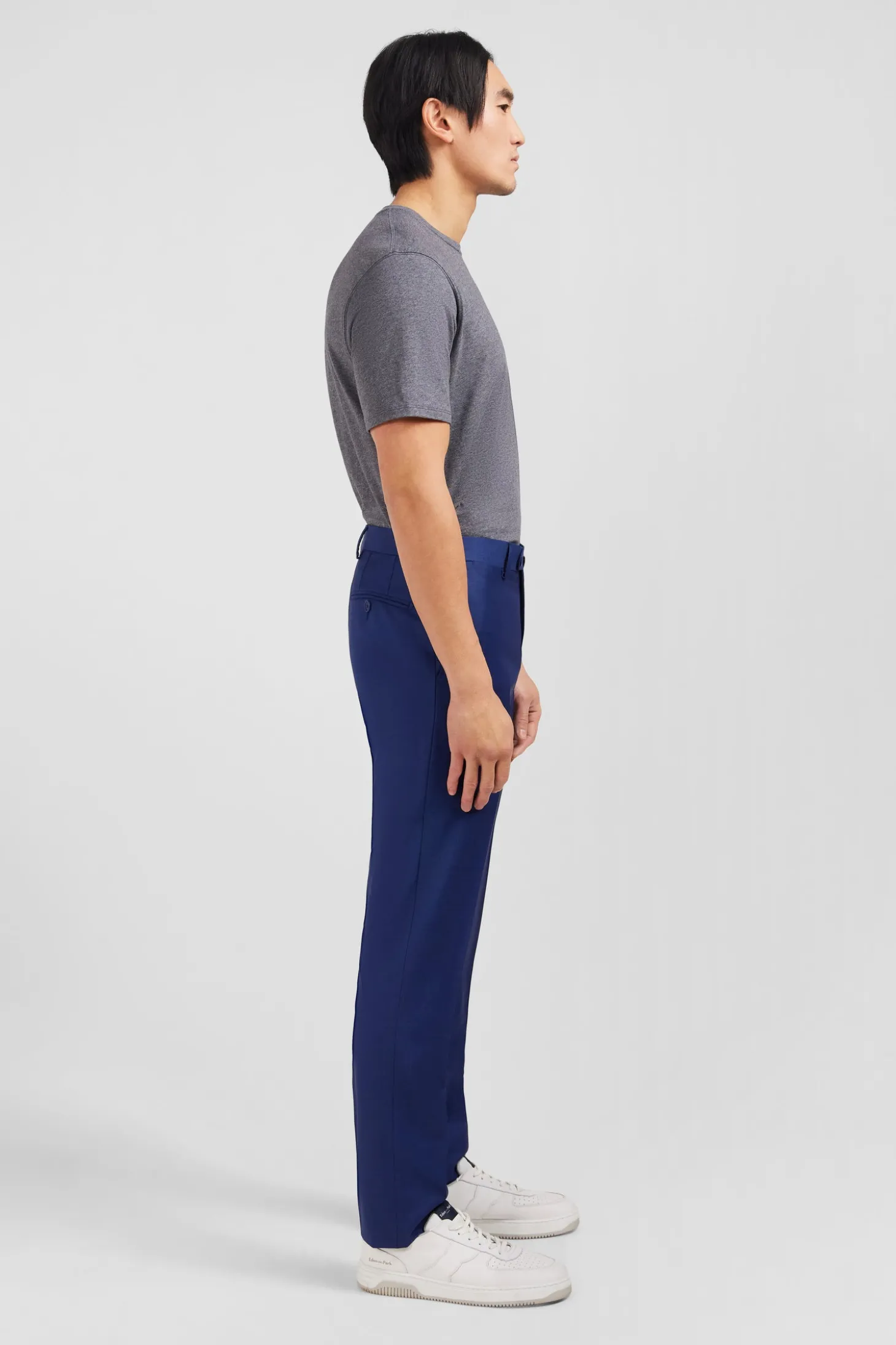 Pantalon slim bleu en laine à plis cassés