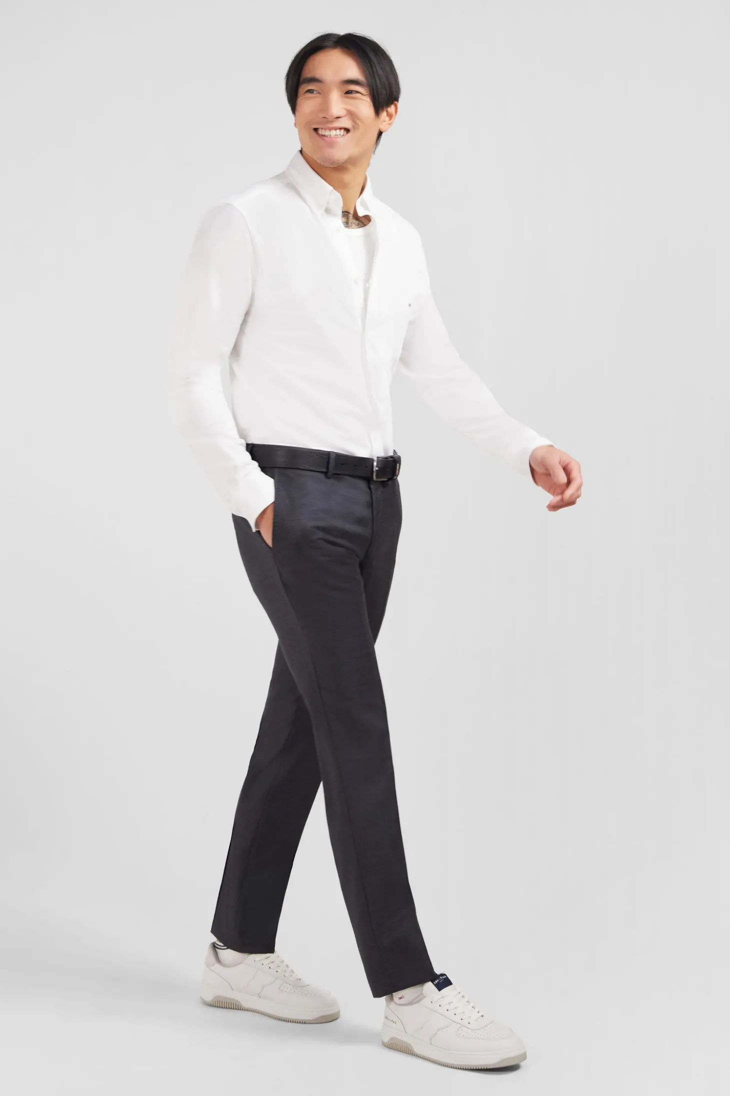 Pantalon slim gris en laine à plis cassés