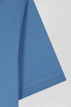 Polo manches courtes en coton stretch bleu coupe Slim