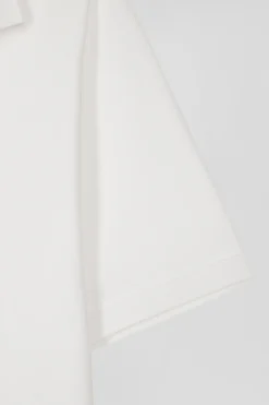Polo manches courtes en coton stretch écru coupe Slim