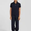 Polo manches courtes en piqué coton bleu marine broderie nœud papillon dos coupe Regular