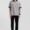 Polo manches courtes en piqué coton noir détails tricolores coupe Oversized