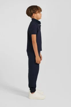 Polo manches courtes en piqué coton bleu marine broderie nœud papillon dos coupe Regular