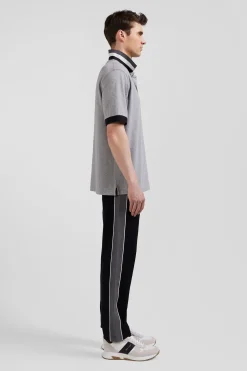 Polo manches courtes en piqué coton noir détails tricolores coupe Oversized