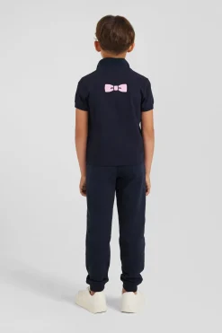 Polo manches courtes en piqué coton bleu marine broderie nœud papillon dos coupe Regular