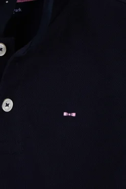 Polo manches courtes en piqué coton bleu marine broderie nœud papillon dos coupe Regular