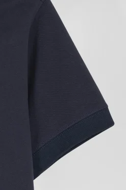 Polo manches courtes uni en coton stretch bleu marine coupe Slim