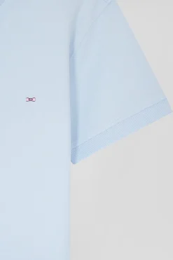 Polo manches courtes uni en coton stretch ciel coupe Slim