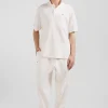 Polo manches courtes unisexe en piqué coton écru surteint coupe Oversized
