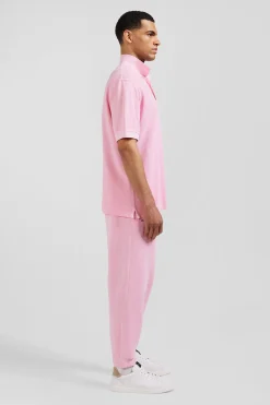 Polo manches courtes unisexe en piqué coton rose surteint coupe Oversized