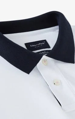 Polo manches longues blanc en coton avec col contrasté