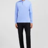 Polo manches longues bleu uni en piqué de coton stretch