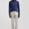 Polo manches longues bleu foncé en coton stretch finitions rayées