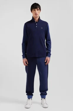 Polo manches longues en piqué coton bleu marine col jacquard écusson gomme coupe Regular
