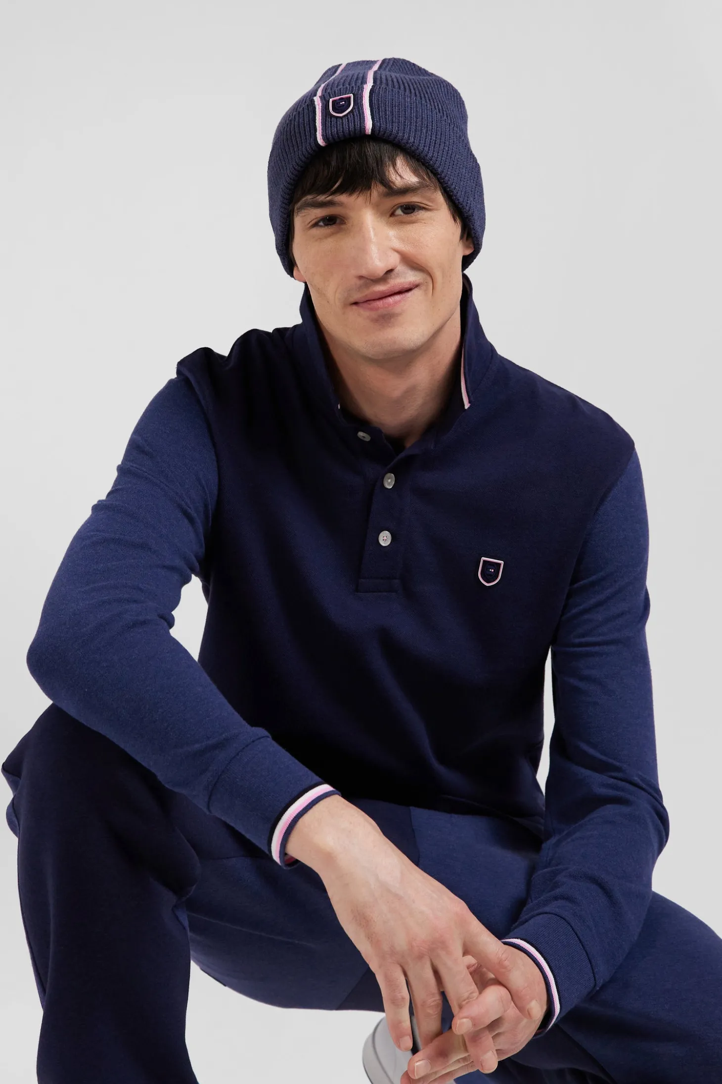 Polo manches longues en piqué coton bleu marine col jacquard écusson gomme coupe Regular