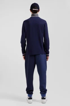 Polo manches longues en piqué coton bleu marine écusson gomme coupe Regular