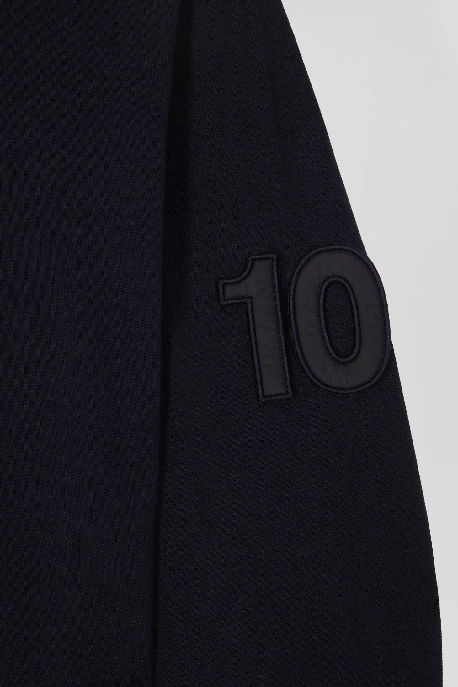 Polo manches longues en piqué coton bleu marine broderie matelassée coupe Regular