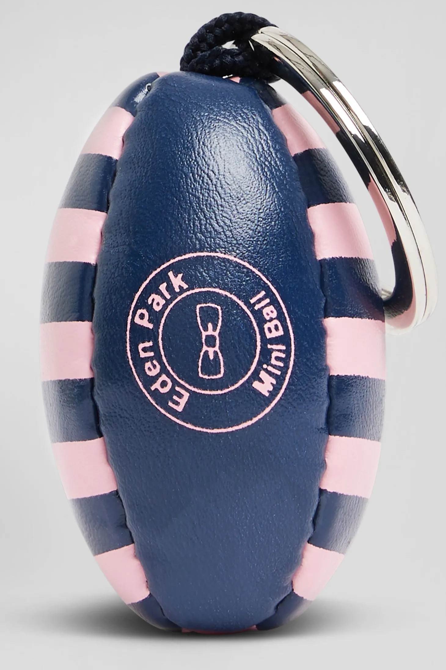 Porte-clés ballon de rugby rose cerclé et sérigraphie French Flair