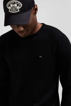Pull col rond uni en laine mérinos noir coupe Regular