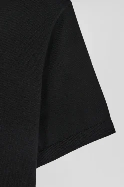 Pull manches courtes à col polo en laine noir coupe Regular